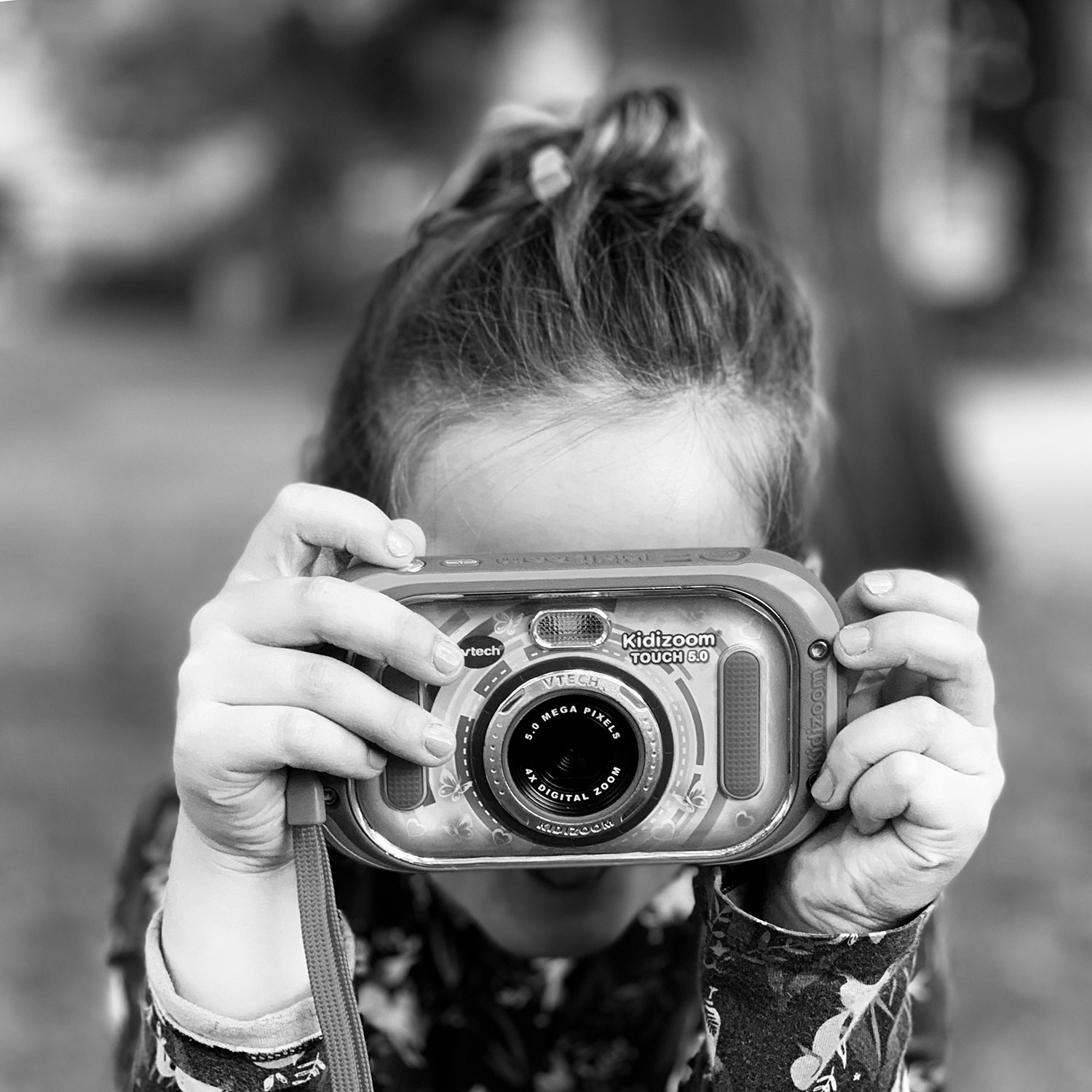 Kleine Fotografin